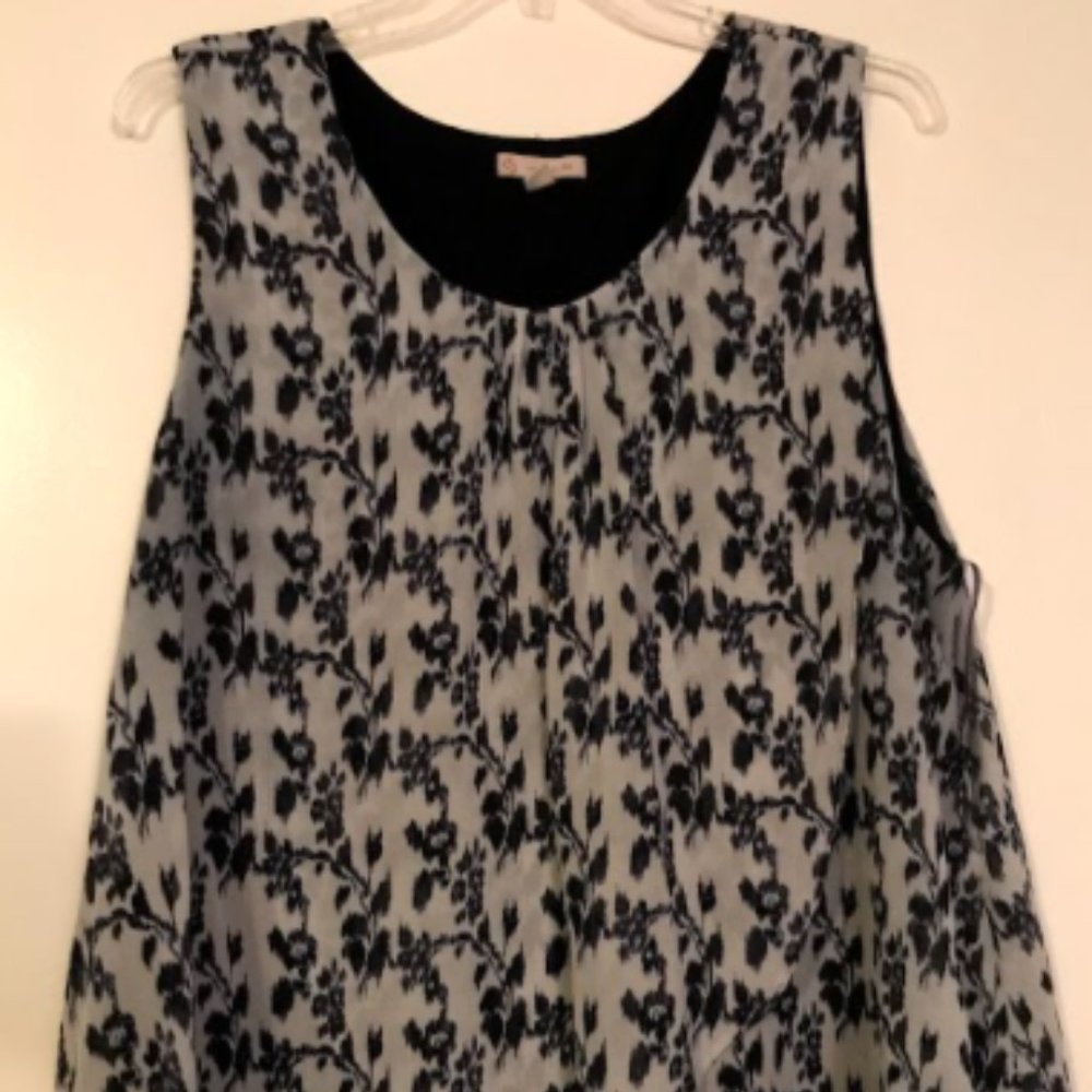 Lined sleeveless tiered-hem blouse